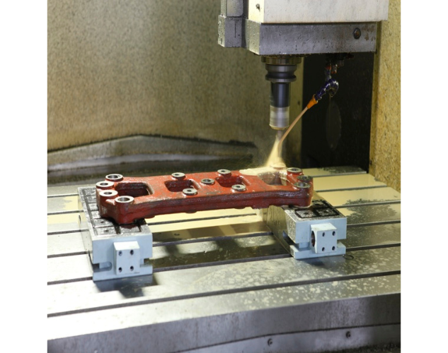 An electro permanent magnetic chuck designed to hold workpieces securely for milling machine applications.