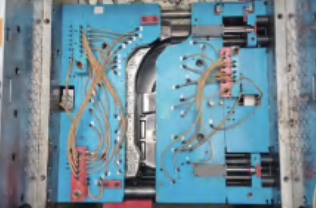 Magnetic quick mold changing clamps used for fast and secure clamping of molds on injection molding machines