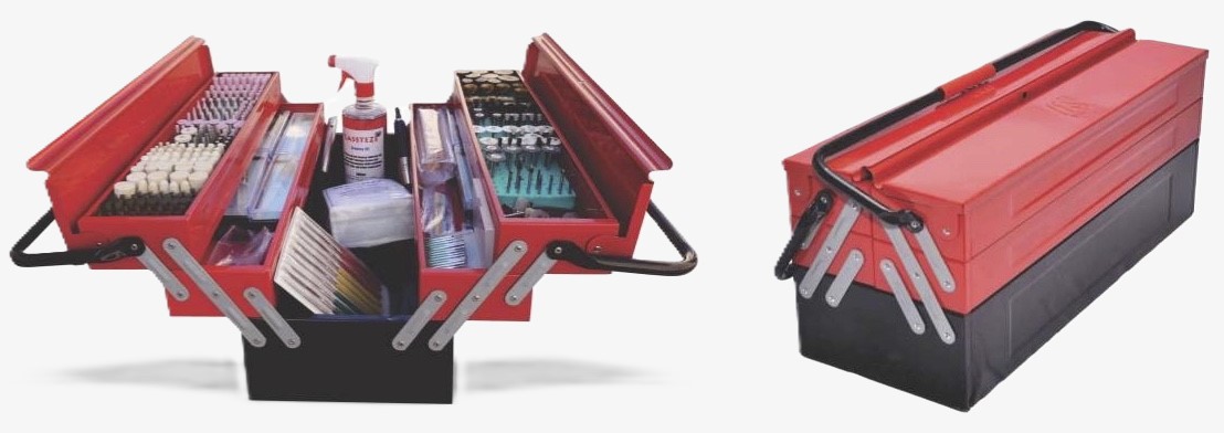 A red, multi-level polishing station with tools and accessories neatly organized for professional metal surface finishing