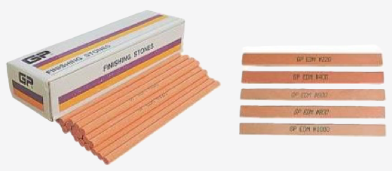 Oil-bound and ceramic polishing stones for achieving high-gloss surfaces in mold manufacturing.