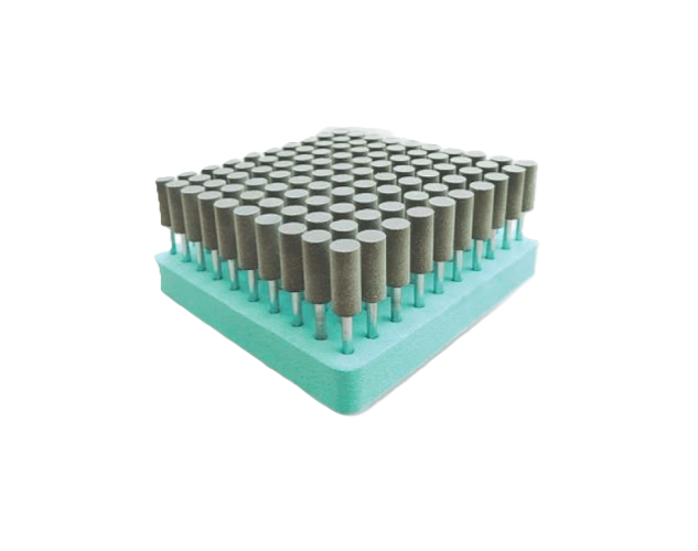 A tray of rubberised mounted points in a grid, used for abrading and polishing mold runners, soft metals, and stubborn deposits.