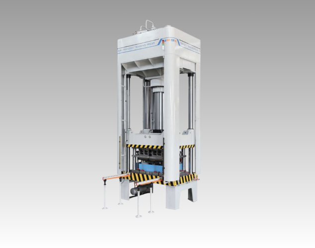 An industrial trimming press for trimming excess material and flash from molded plastic and metal parts.